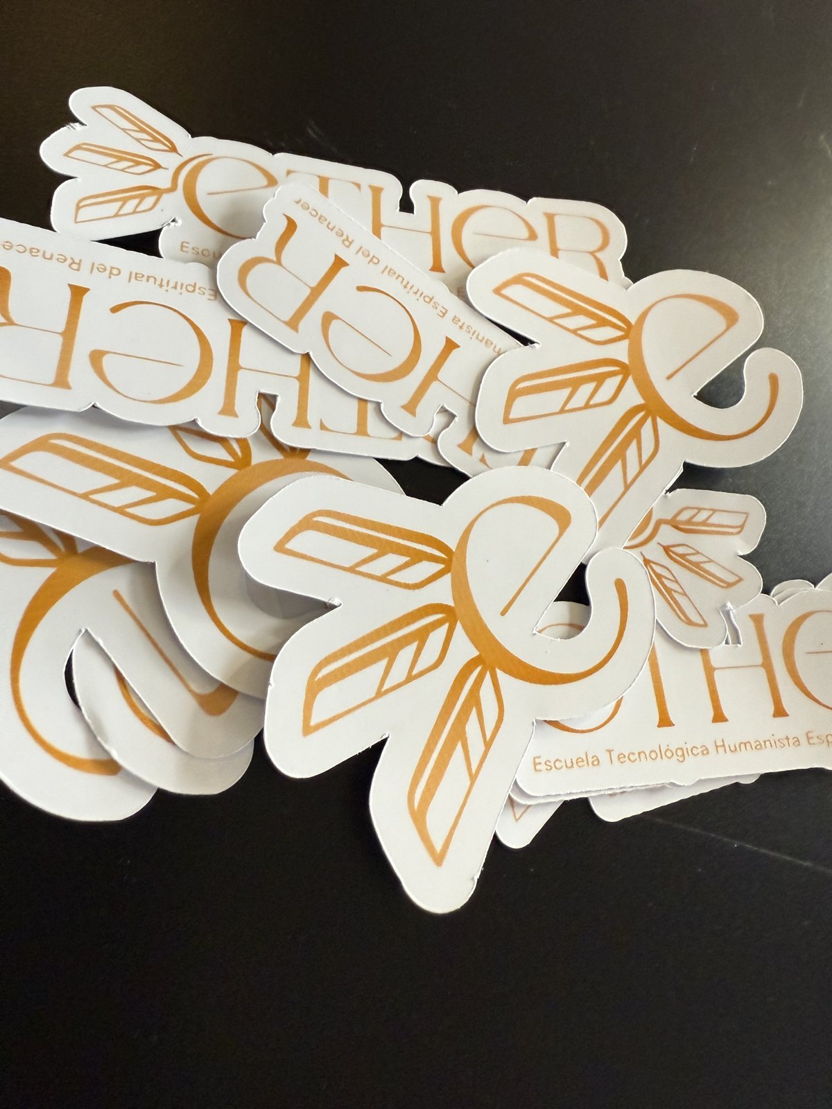 Stickers troquelados ETHER en dorado