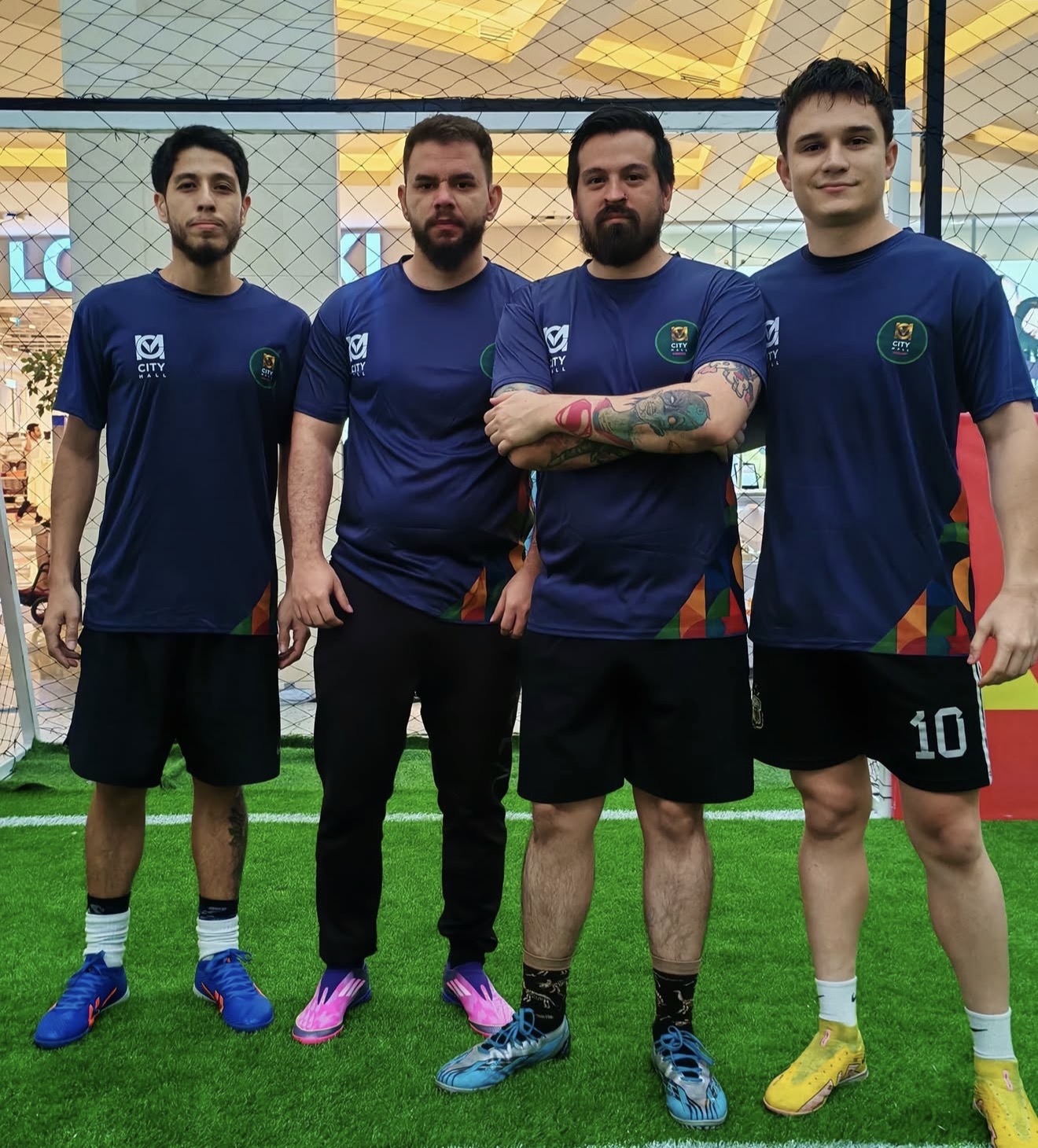 Equipo con camisetas de fútbol City Mall azul marino
